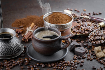 Black coffee on an old background in a cup