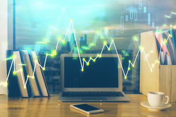 Financial market graph hologram and personal computer on background. Multi exposure. Concept of forex.