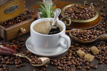 Black coffee on an old background in a cup