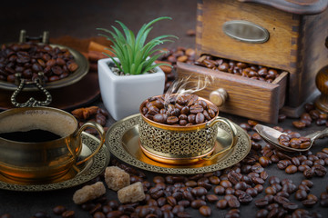 Coffee grains on a table with accessories for coffee