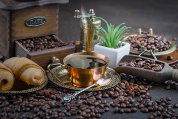 Black coffee on an old background in a cup