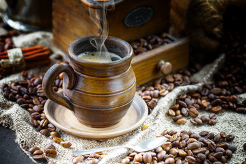 Black coffee on an old background in a cup