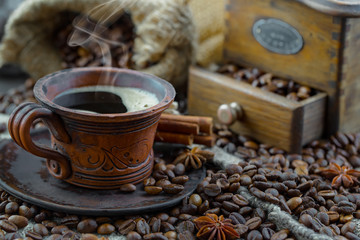 Black coffee on an old background in a cup