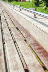 wooden surface of the bench in the park 