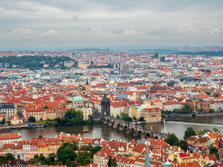 Naklejka na ściany i meble Praha City vie with old architecture and dark stunning clouds 