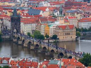 Fototapeta na wymiar Praha City vie with old architecture and dark stunning clouds 