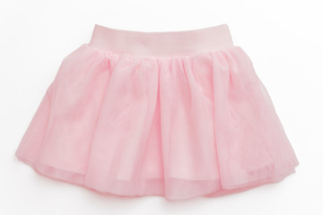 Tulle pink skirt  for toddler girl on white background/ Top view/ Baby clothes 