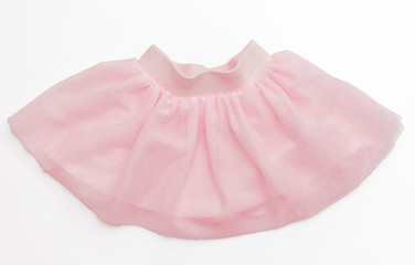 Tulle pink skirt  for toddler girl on white background/ Top view/ Baby clothes 