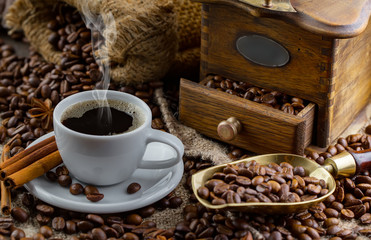 Black coffee on an old background in a cup