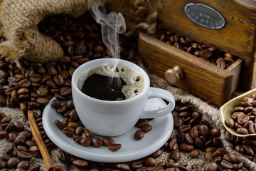 Black coffee on an old background in a cup