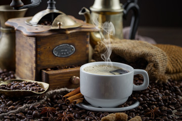 Black coffee on an old background in a cup