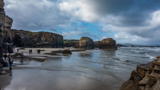Cathedral beach time-lapse with blurred tourists