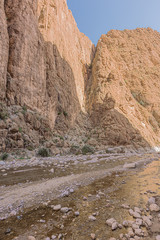 View of a crevasse in the wall of the Todra Gorge while walking on the bottom of the canyon