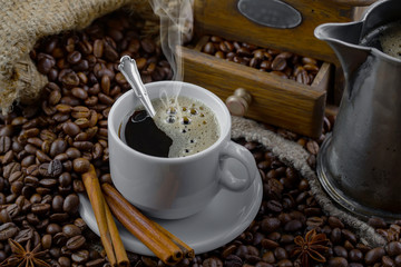 Black coffee on an old background in a cup