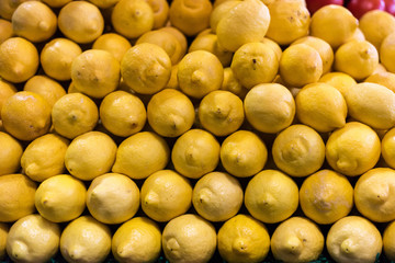 Pile of lemons for sale at market