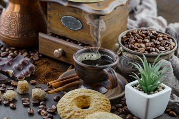 Black coffee on an old background in a cup