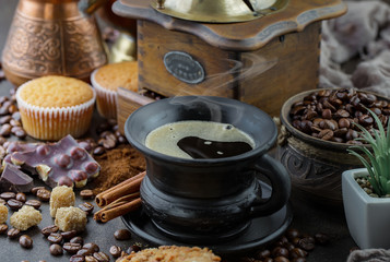 Black coffee on an old background in a cup