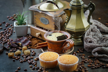 Black coffee on an old background in a cup