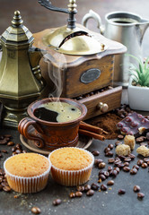 Black coffee on an old background in a cup