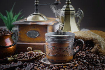 Black coffee on an old background in a cup
