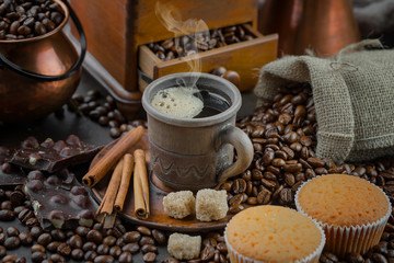 Black coffee on an old background in a cup