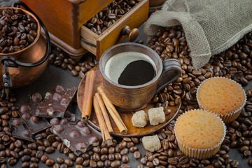 Black coffee on an old background in a cup