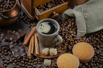 Black coffee on an old background in a cup