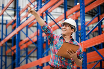 Asian Engineer man working in building factory