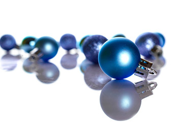 Xmas decoration on pink background. Christmas bubble decoration. Flat lay. Pattern winter balls concept