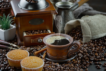 Black coffee on an old background in a cup