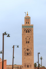 Fototapeta premium View of the minaret of the Koutoubia mosque seen from the Djemaa el Fna Square in Marrakech