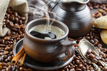 Black coffee beans on an old backgroundм