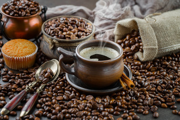 Black coffee beans on an old backgroundм