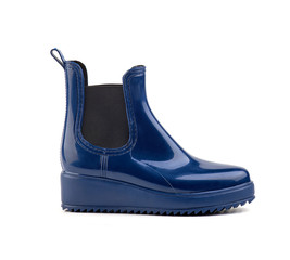 blue colored rubber women rain boots on a white background isolate.
