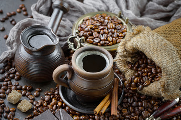 Black coffee on an old background in a cup