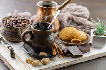 Black coffee on an old background in a cup