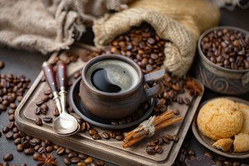 Black coffee on an old background in a cup