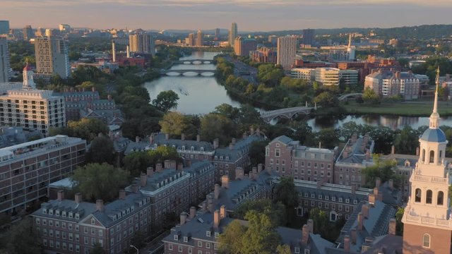 Aerial:flying over Harvard University & Charles River at sunrise. Boston, Massachusetts, USA. 