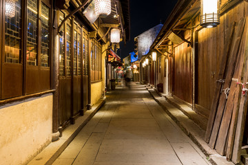 Naklejka na ściany i meble At night, the streets of Zhouzhuang Ancient Town, Suzhou, China