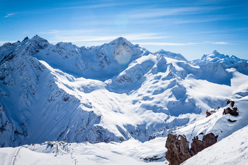 Winter panoramic view of the snowy high mountains of Elbrus in the Russia