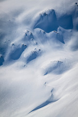 Fototapeta na wymiar Beautiful winter panorama with fresh powder snow. in tall mighty mountains Elbrus, ski resort, the Republic of Kabardino-Balkaria, Russia