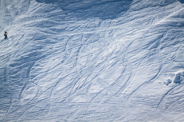 Traces of skis on the snow-white tall mighty mountains Elbrus, ski resort, the Republic of Kabardino-Balkaria, Russia