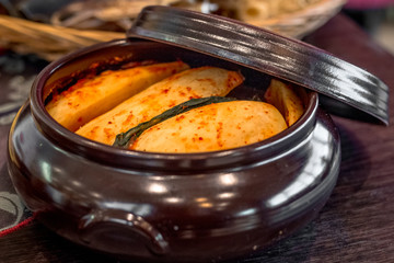 KimchiKimchi in a special pot. Dish of national Korean cuisine for long-term storage of cabbage with hot red pepper