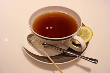 A cup of tea with lemon