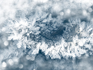 winter background with snowflakes crystals patterns and snow on frozen grass