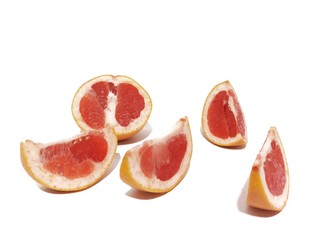 Fototapeta na wymiar slice of grapefruit isolated on white background.Fresh orange with shadow isolate on white background. The slice orange on white background.