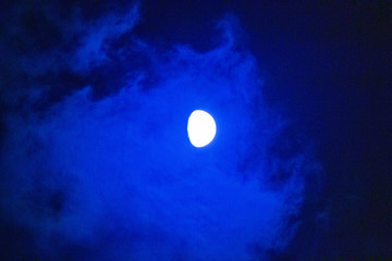 Naklejka na ściany i meble 濃い青の夜空と月　moon in deep blue sky 