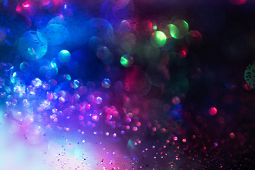 Obraz na płótnie Canvas glitter bokeh lighting effect Colorfull Blurred abstract background for birthday, anniversary, wedding, new year eve or Christmas
