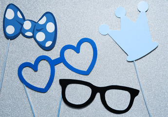 Photo booth props on blue backgorund.  © MagicsPhotos