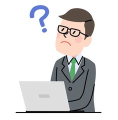 パソコンを使うビジネスマン　疑問